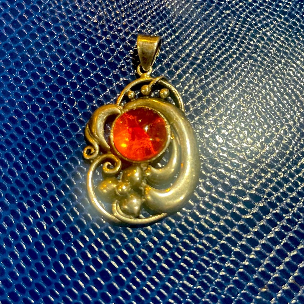 Art nouveau pendant with amber stone